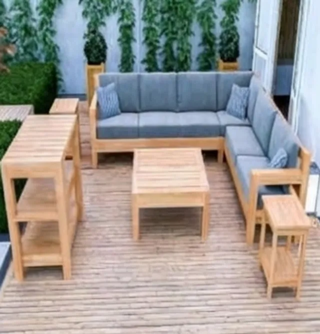 Wooden outdoor sectional sofa with coffee table on a deck