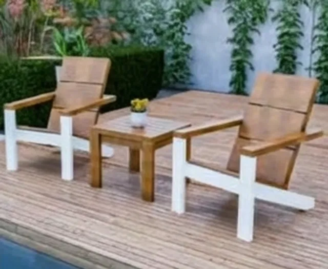 Two wooden patio chairs with a side table